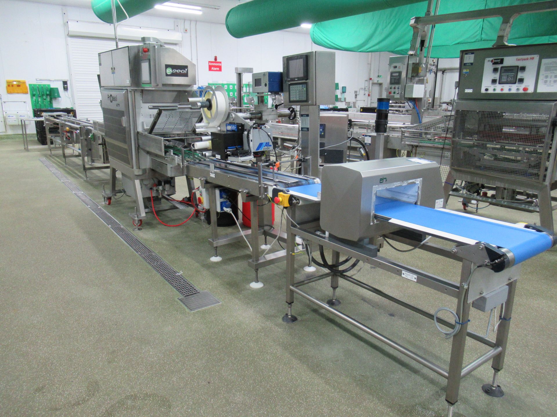 ALL INCLUSIVE LOTS 9-13: Tray filling and sealing line 2 comprised of; Proseal APC chain conveyor.