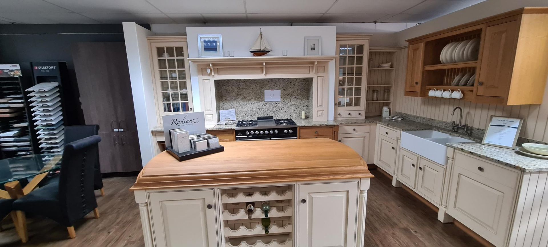 Showroom Hatt kitchen comprising: Door – Face Frame MDF hand painted Cream with feature units in