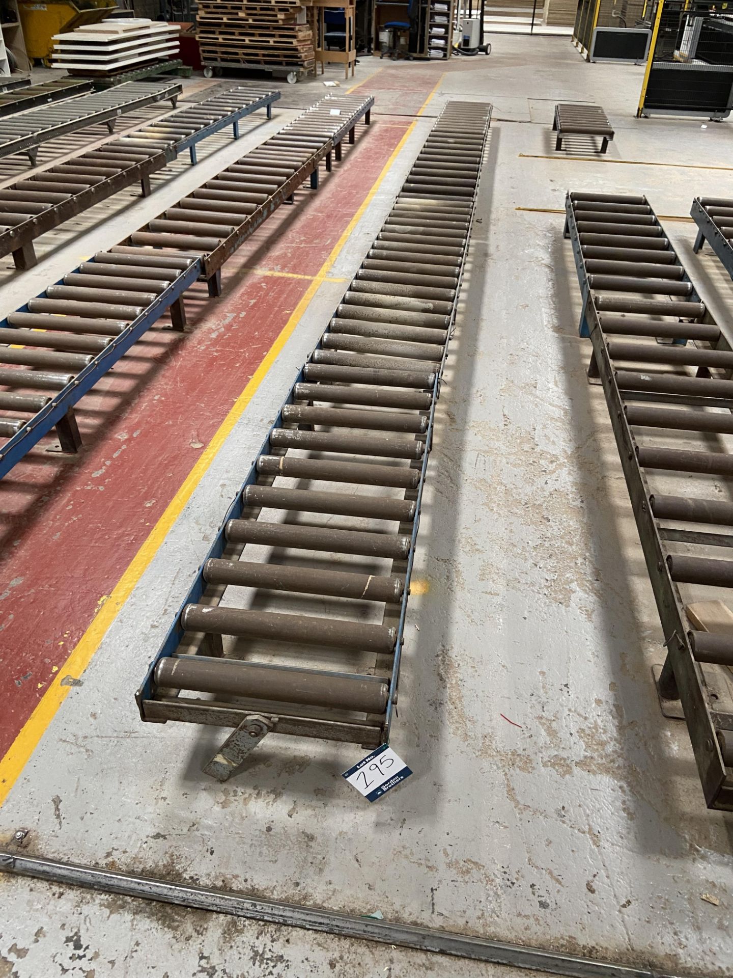 4 Section gravity roller conveyoring, total width 490mm, total length 8000mm, height 240mm