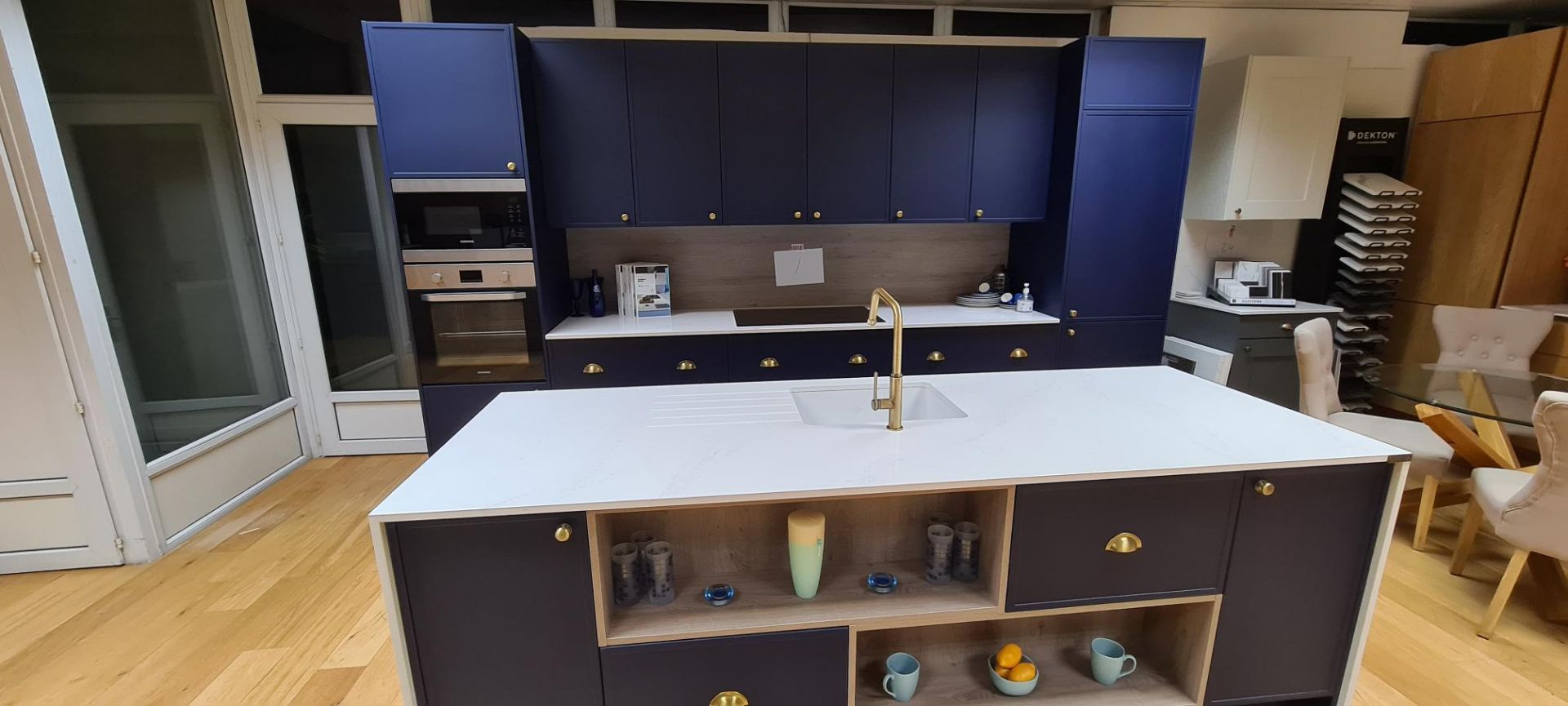 Showroom Hatt kitchen comprising: Door – Marine Blue “tray” 20mm shaker single piece vinyl