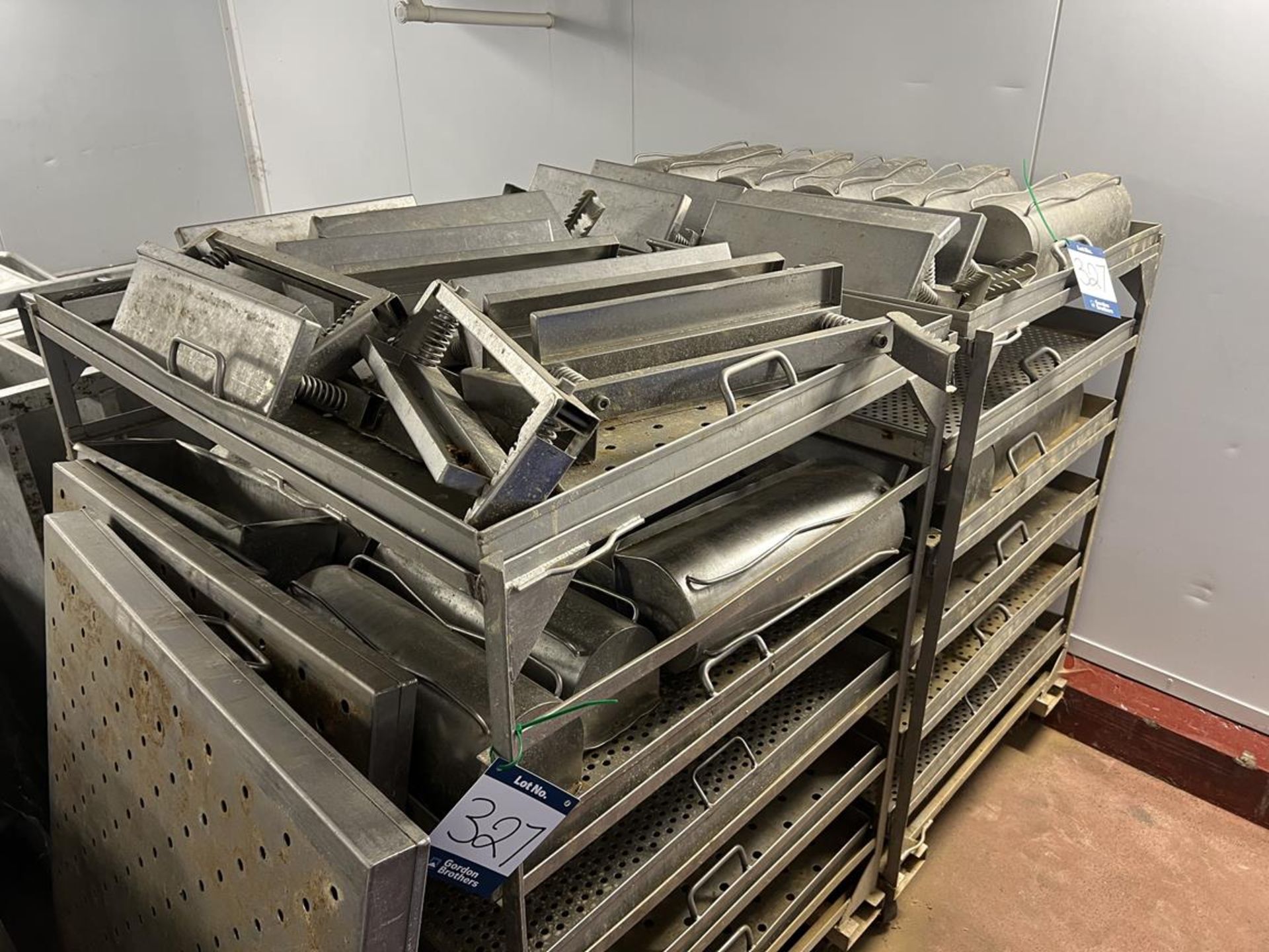 2x (no.) Stainless steel mobile trolleys with semi-circular corned beef moulds and spring loaded