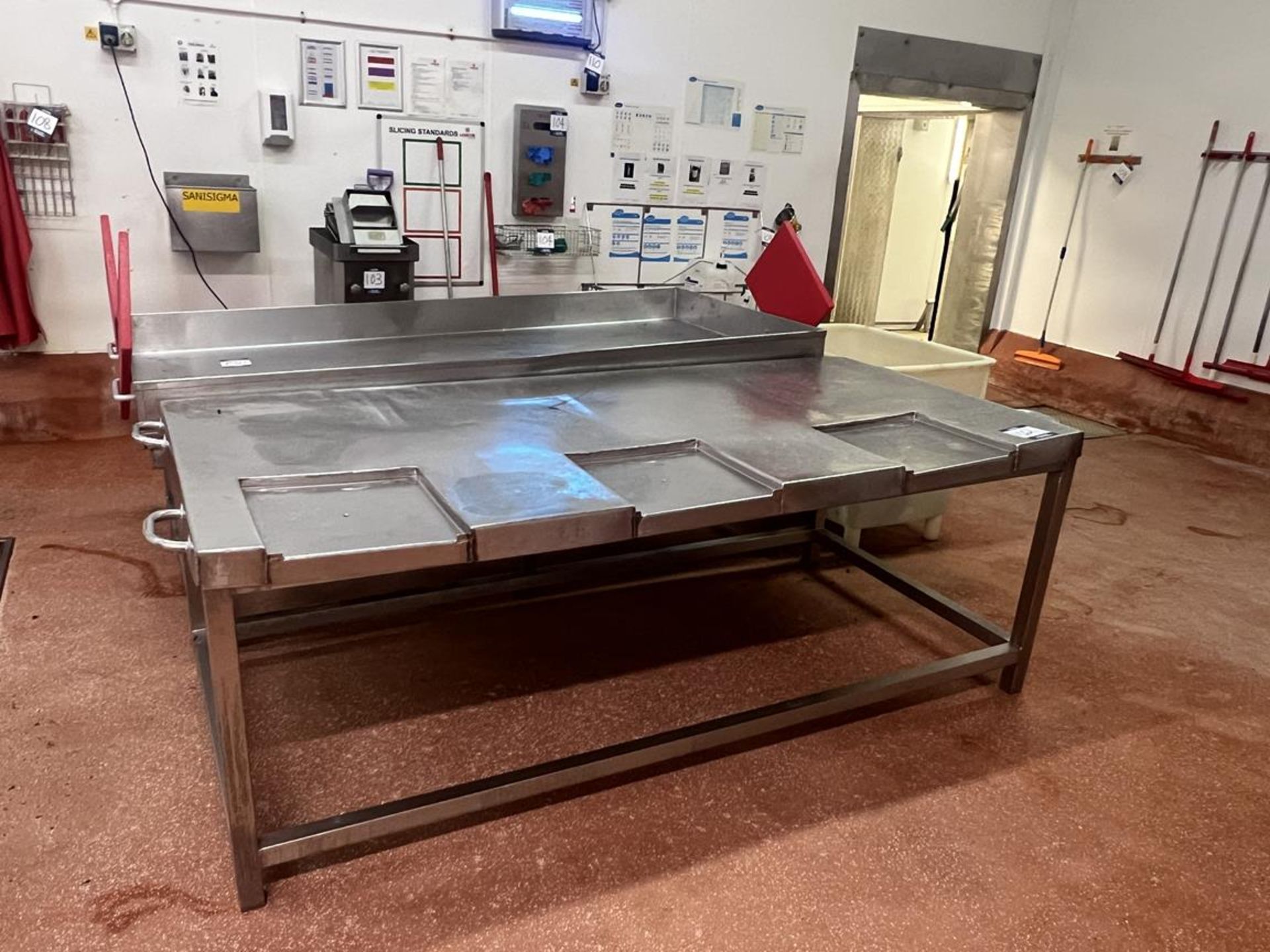 2x (no.) stainless steel cutting tables; 2.35m x 1.1m and 2.38m x 1.12m