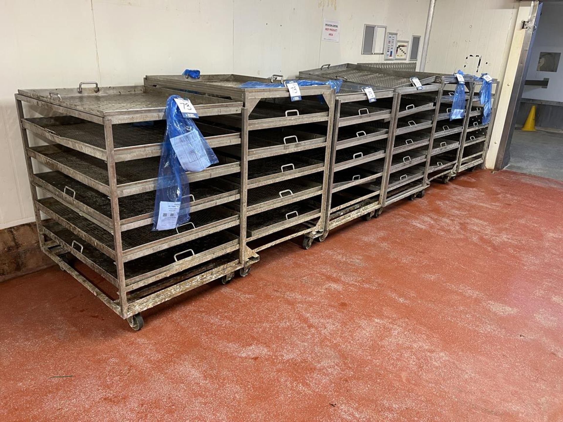 6x (no.) six/seven tier stainless steel product racks on wheels, size of removable trays 1030mm (