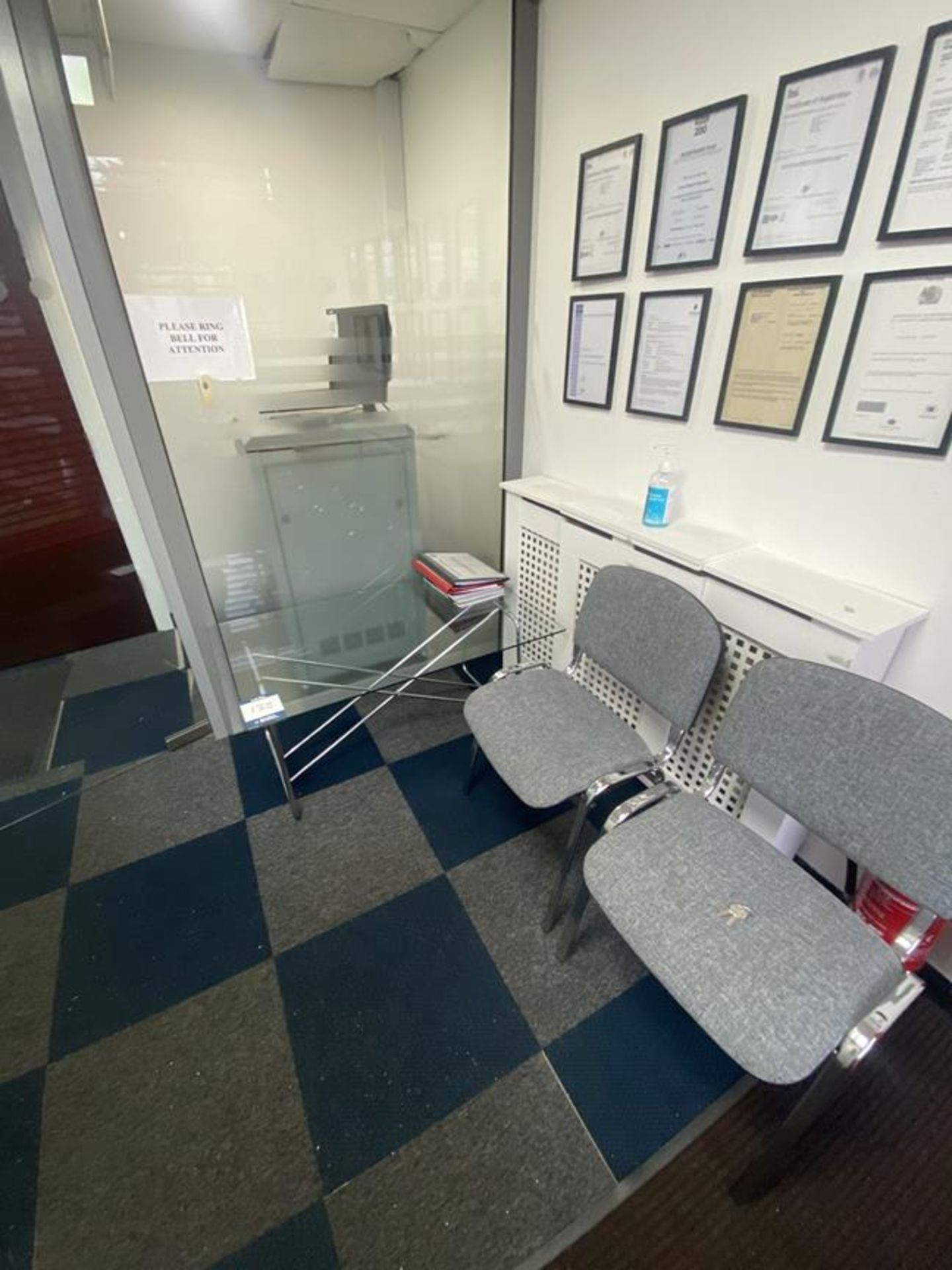 Glass low level meeting table and display case , 2 reception chairs