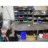 Steel fabricated work bench with 2 no 5 tier storage units containig bolts , screws, fastners