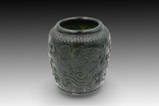 A Chinese Green Jade Bowl adorned with Floral Patterns Diameter: Approximately 5cm