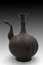 An Islamic Water Jug with an Exquisite Patterned Design. Height: Approximately 30 cm.