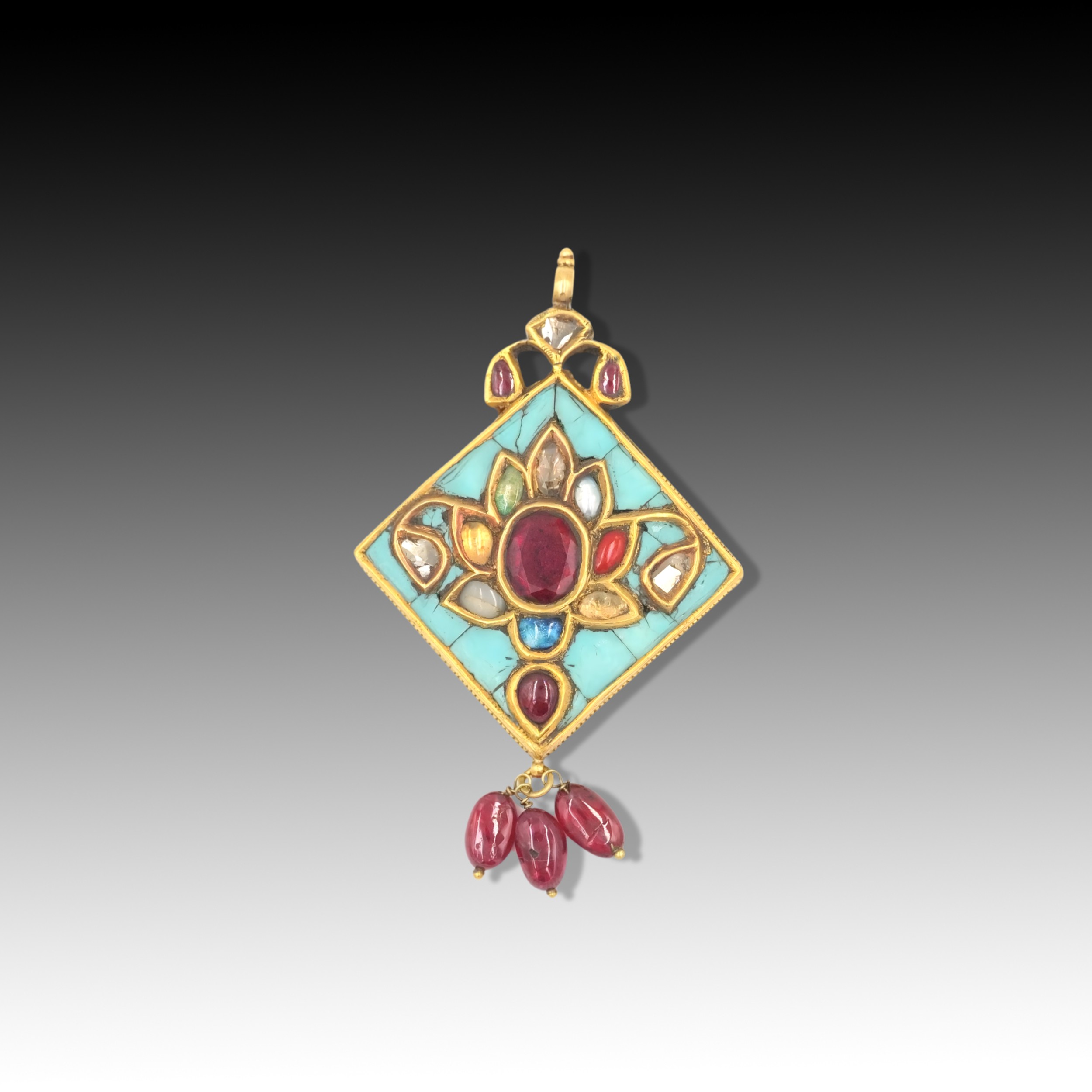 An Indian High Karat Gold Pendant Embellished with Citrine, Emerald, Rubies, Turquoise, Rose-cut Dia