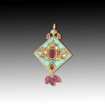 An Indian High Karat Gold Pendant Embellished with Citrine, Emerald, Rubies, Turquoise, Rose-cut Dia
