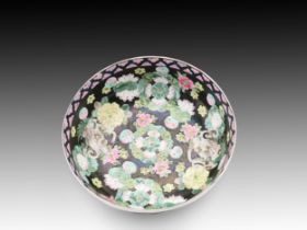 A Japanese Green and Black Bowl from the 19th Century with Dragons and Flowers Diameter: Approximat