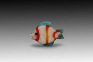 An Ancient Egyptian Fish Amulet Height: Approximately 2.4cm Length: Approximately 3.1cm