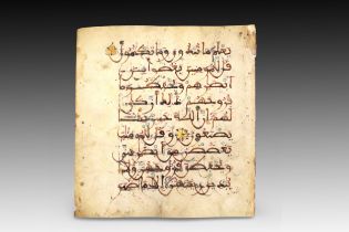 An Islamic Leaf from the Quran Crafted from Vellum during the 13th Century. This Leaf contains 9 Lin