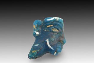 An Ancient Egyptian Ptolemaic Glass Face Inlay from Around 332-32 B.C. Length: Approximately 2.5cm