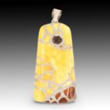 A Butterscotch Amber Pendant with Intricate Silver Inlay Height: Approximately 12.2 cm Weight: 96.2