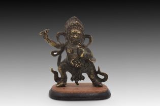 A Chinese Bronze Tibetan Statue of Vajrapani from the 18th Century with a Wooden Stand Height: Appr