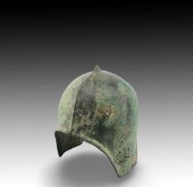 An Ancient Roman Helmet with Lovely Patina Height: Approximately 23cm