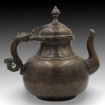 An Islamic Mughal Bronze Teapot from the 19th Century with Intricate Carvings. Height: Approximatel