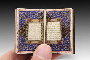 An Islamic Miniature Quran written in 1199 by Fatimah bint Ustad Yahya Helmy with a Silver Case Hei