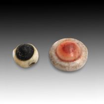 An Egyptian Pair of Eyes made from Glass and Agate