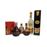 Four bottles of liqueur to include Cusenier 70° proof orange liqueur (12 fl. oz.), Asbach Uralt