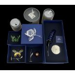 A number of Swarovski crystal flower and insect figures including 'Bumblebee' (7615 000 002) no