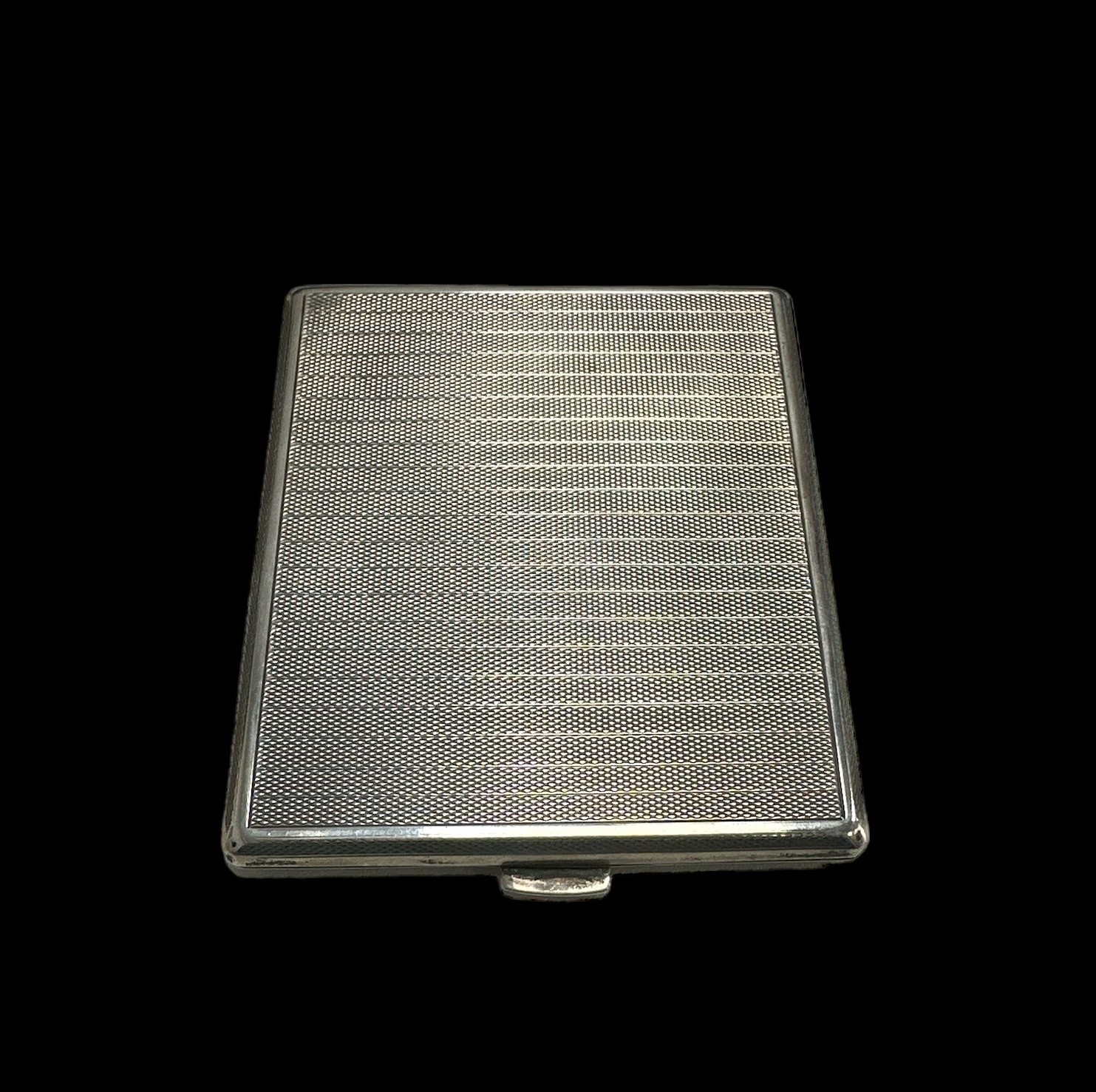 A silver cigarette case with 1931 Birmingham hallmarks. Dimension 83mm x 95mm and weight 130g approx