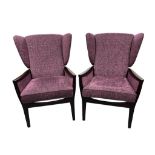 A pair of mid 20th Century Parker Knoll arm chairs, recently reupholstered, width 64cm, depth