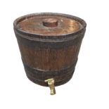 Banded oak barrel with brass tap, height 35cm, diameter 38cm.