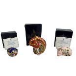 Three Royal Crown Derby paperweights, all boxed. Includes Millennium Bug, with gold stopper and