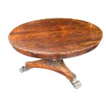 Late Regency William IV rosewood breakfast table with triform base and paw feet. Diameter 130cm.
