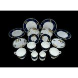 A Wedgwood Bone China Citrons (1993) part service to include; two small coffee cups and saucers,