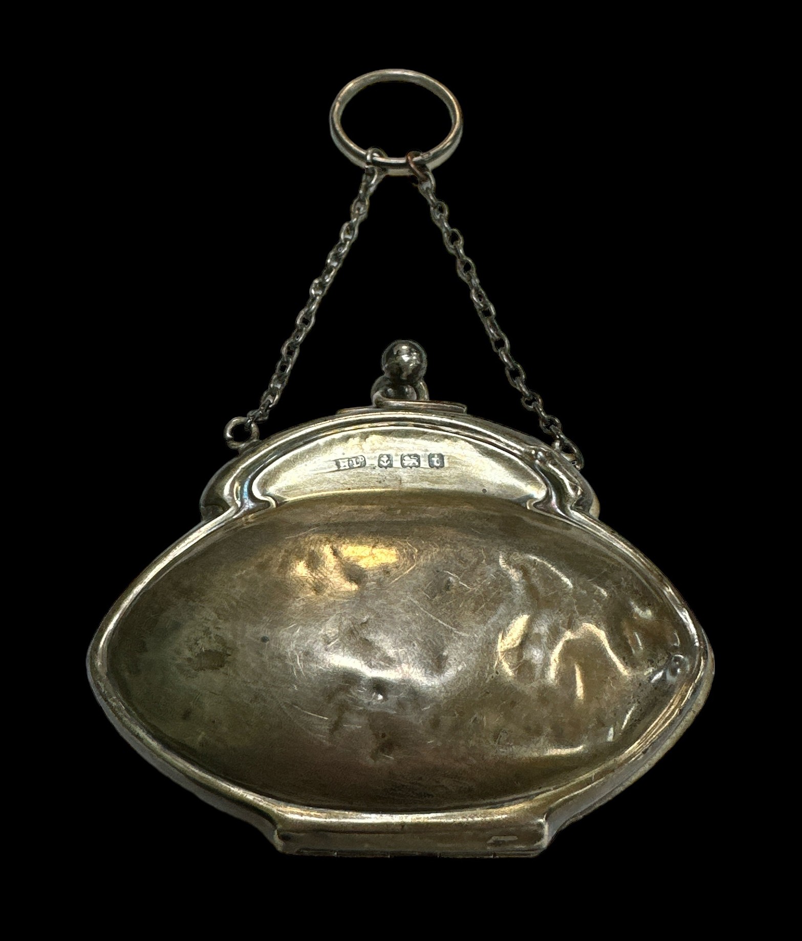 A hallmarked silver coin purse, with interlocking ball ended clip, and ring pull carry handle. - Image 2 of 3