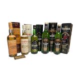 Five bottles of Malt Scotch Whisky in presentation tins/tubes to include Glenfiddich Special Reserve