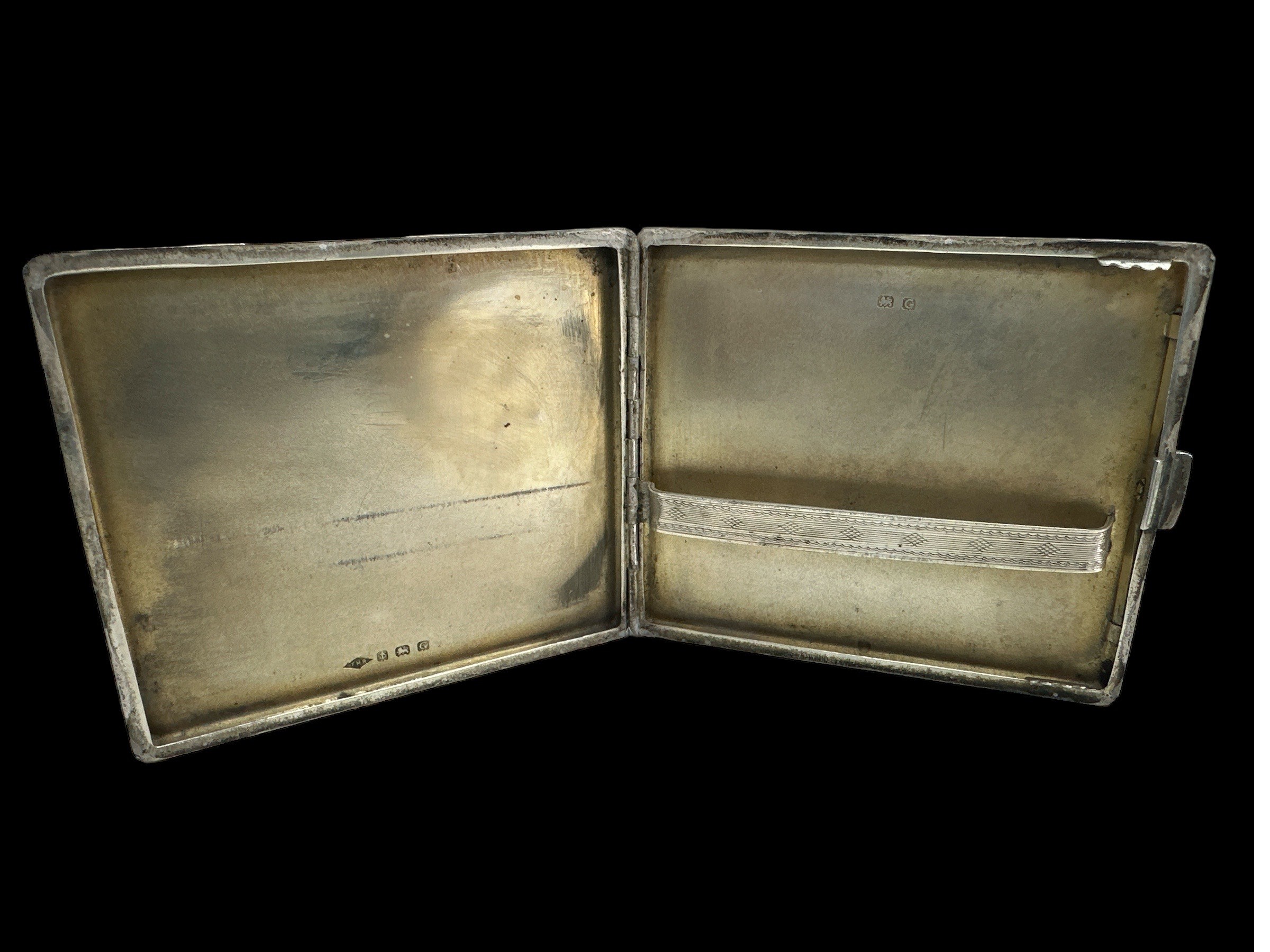 A silver cigarette case with 1931 Birmingham hallmarks. Dimension 83mm x 95mm and weight 130g approx - Image 2 of 3