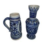 Pair of German blue and grey salt glaze stoneware (Westerwald style) items to include; a handled