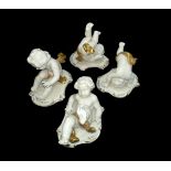 Rudolph Krammer set of four ceramic cherubs with gold gilt details. Each with the Rudolph Krammer ‘