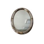 Oval mirror with mirrored mosaic border, 78cm x 59cm.
