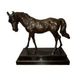 A large bronze sculpture of a standing horse, signed ‘Barye’ to base, Antoine-Louis Barye (French,