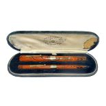 Waterman Ideal 'Ripple' fountain pen and pencil cased twin set, both with 9ct gold bands