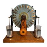 A Whimshurst electrostatic machine, with 14 inch discs, two turning handles. Pyrex jars (2) on