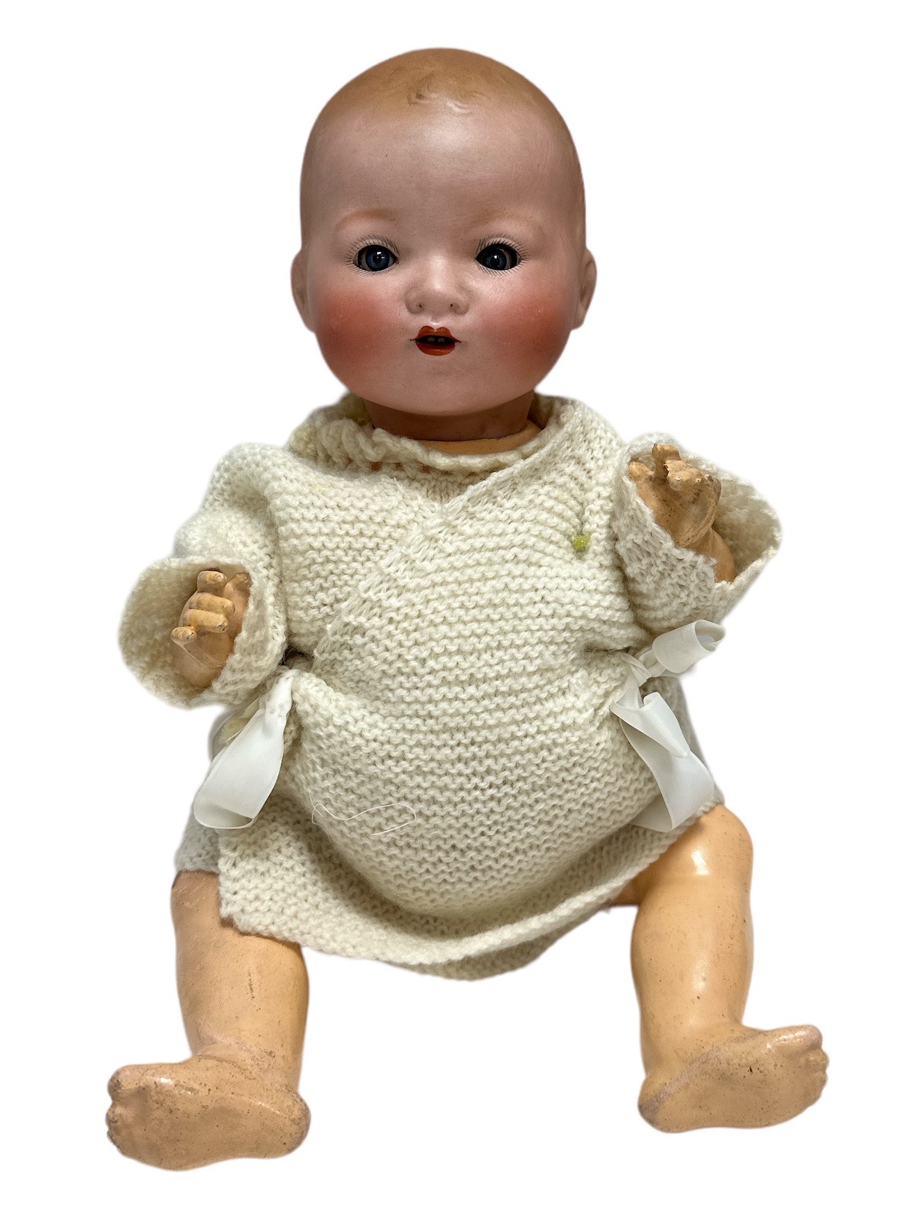 A 19th century Armand Marseille doll with bisque head, blue glass eyes and two lower front teeth ,