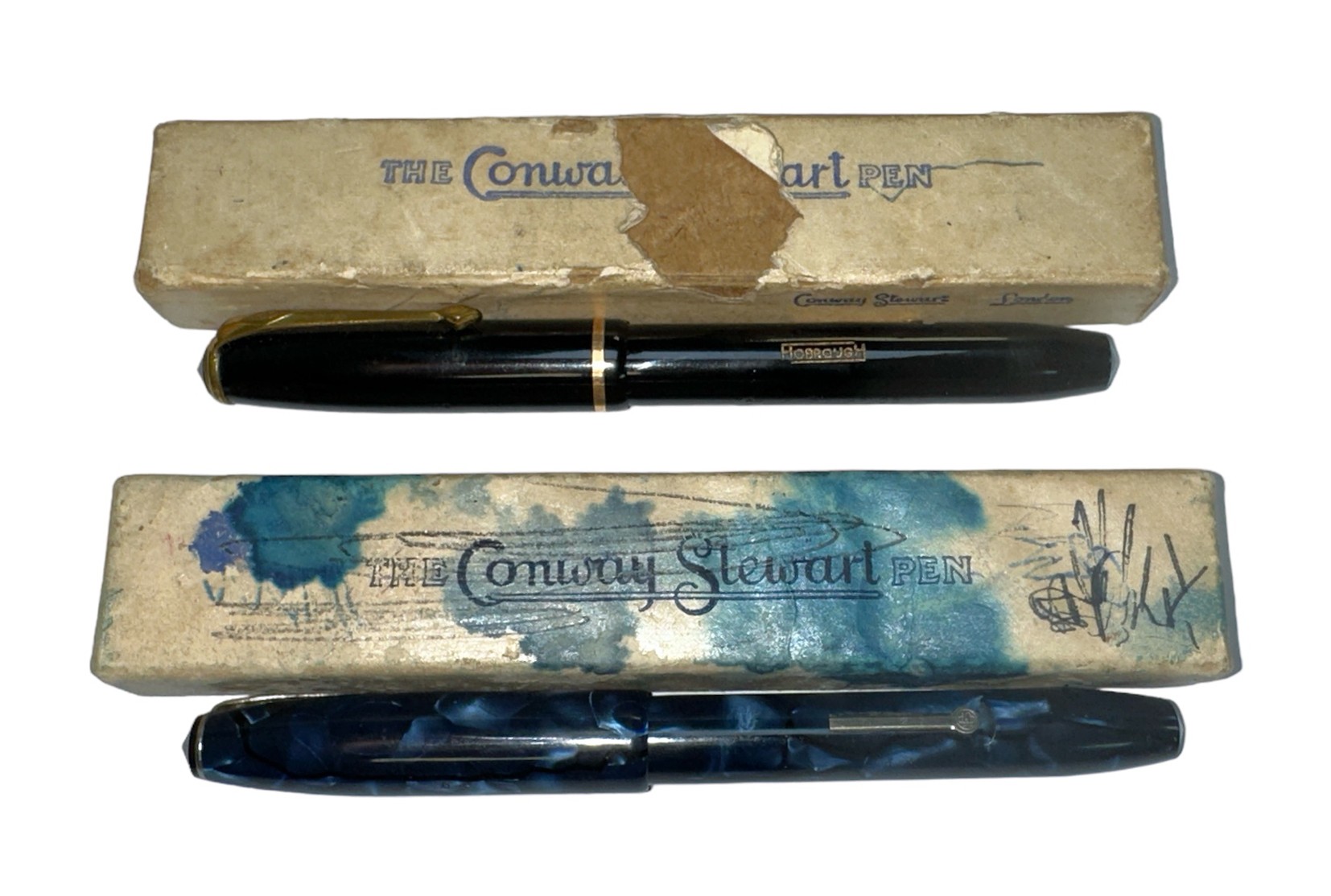 Pair of boxed Conway Stewart lever fill fountain pens, both with 14ct gold nibs. Qty 2