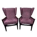 A pair of mid 20th Century Parker Knoll arm chairs, recently reupholstered, width 64cm, depth