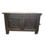 17th Century elm coffer carved to front and sides, width 92cm, depth 51cm, height 56cm.