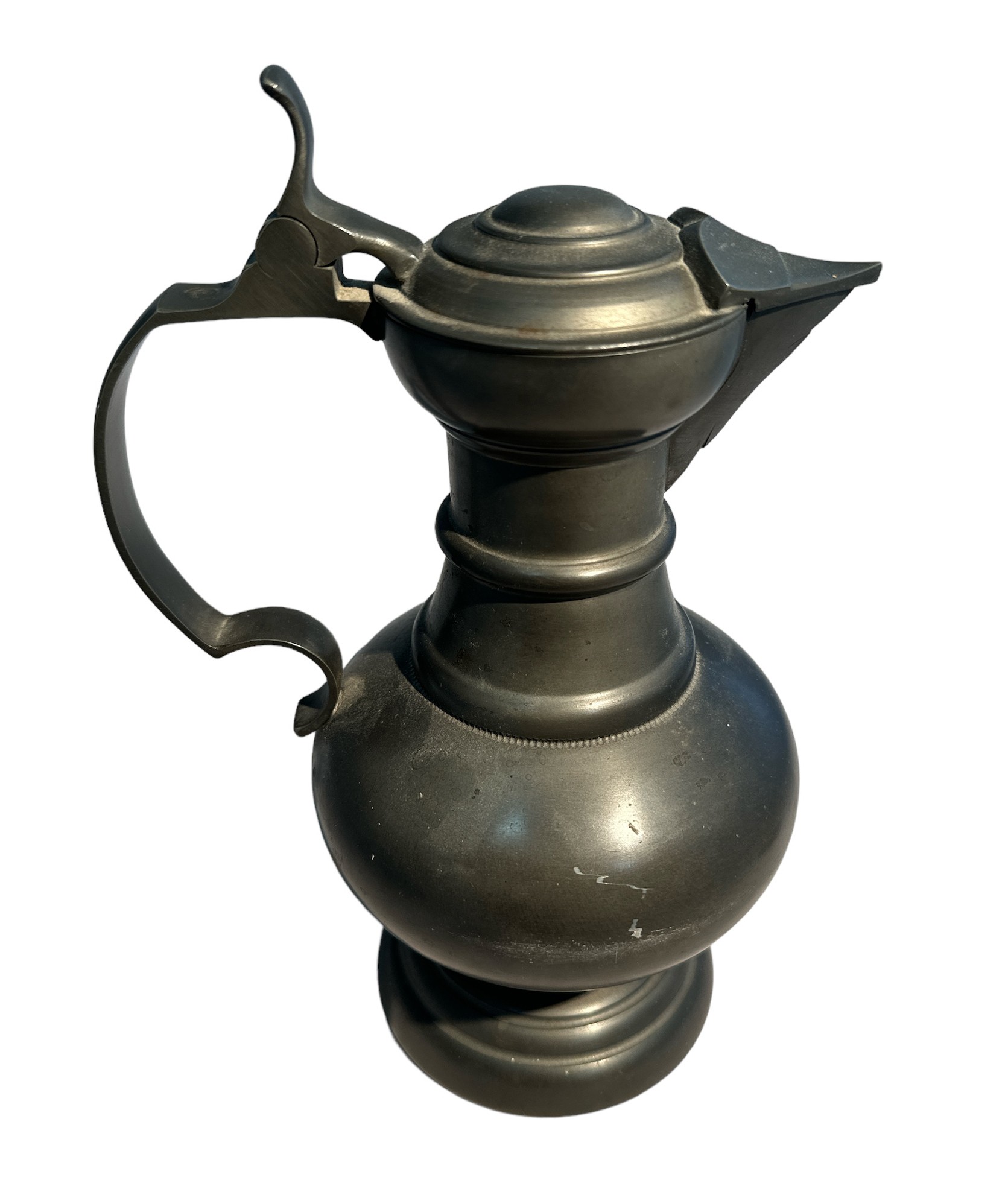 Pewter lidded jug (height 26cm) with two-sided religious token (possibly lead) 6cm x 5cm. - Image 2 of 3