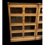 Minty oak stacking barrister bookcase - four sections with double opening door to each, width 89.