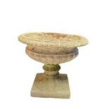 A concrete pedestal urn/planter, height 40cm, diameter 45cm.