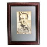 Basil Rathbone (1892-1967) – A framed black and white photograph signed by Basil Rathbone in black