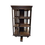 Large mahogany revolving bookcase, height 122cm, top 62cm square.