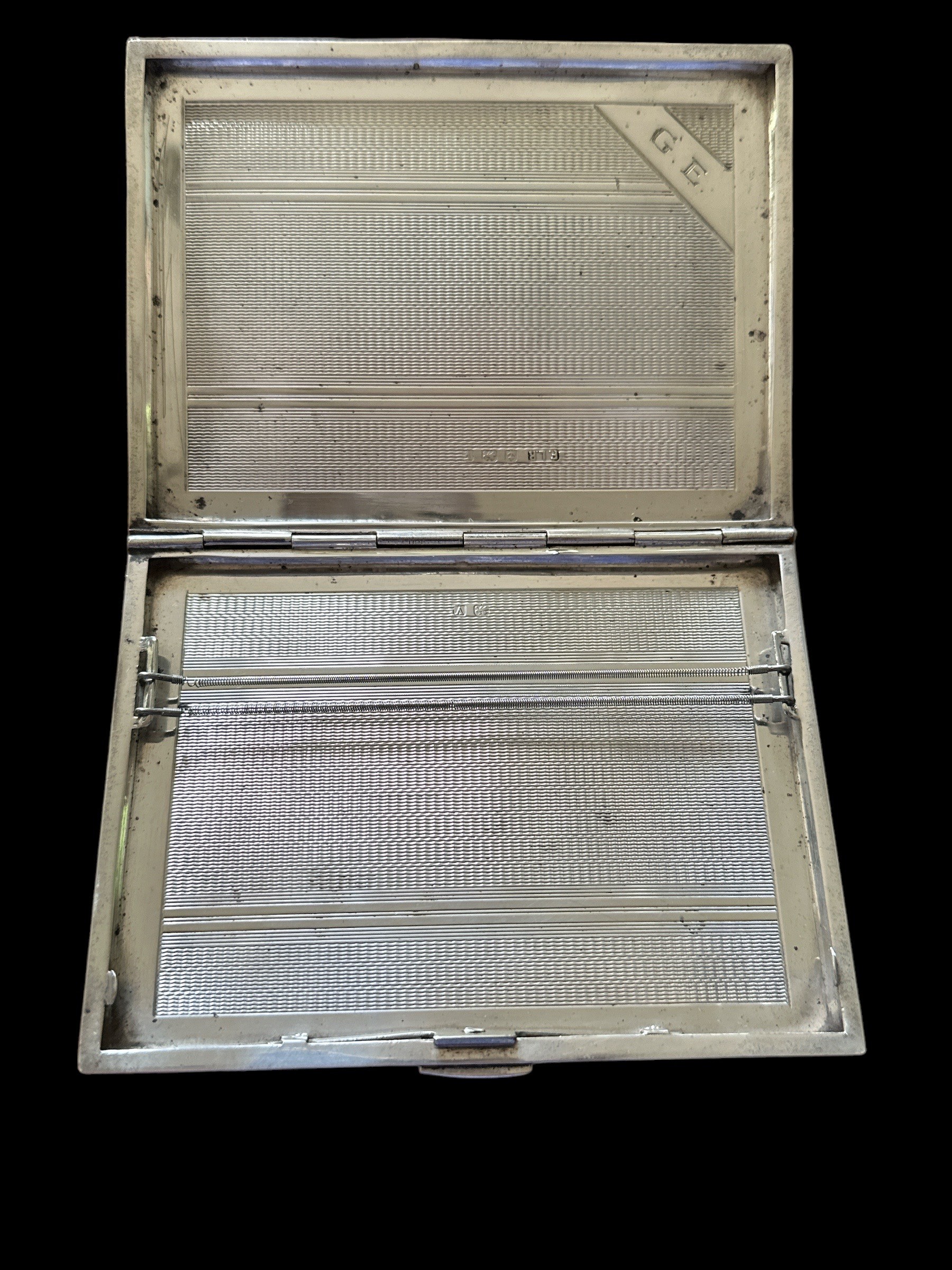 A silver cigarette case with engine turned pattern, Birmingham hallmarks for 1920. Approx 98g. 11. - Image 2 of 2